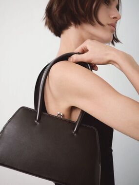 Mango gray-brown kisslock purse never worn